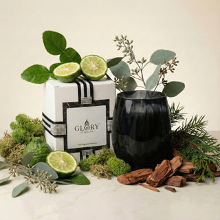 Earth’s Embrace Feng Shui earth element luxury candle in glossy obsidian black glass styled with bergamot, cedar, moss, eucalyptus and GLORY STRENGTH gift box