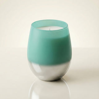 Earth’s Embrace Feng Shui earth element luxury candle in turquoise-to-silver ombré matte glass vessel on ivory background