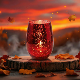 Ember Allure Feng Shui fire element luxury candle lit at fiery autumn sunset with falling leaves and red mercury glass glow