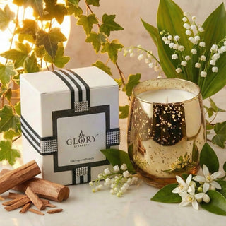 Legacy Collection Tomorrow flagship luxury candle in gold mercury glass styled with lily of the valley, sandalwood and GLORY STRENGTH gift box