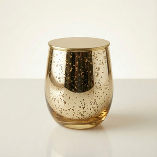 Legacy Collection Tomorrow flagship luxury candle in gold mercury glass with polished gold lid on ivory background